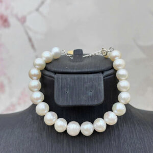 L046 - Lắc tay trứng 7-8 li ánh tím/trắng