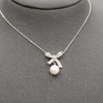 Dây chuyền nơ ngọc trai -D224